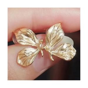 Xinfly Joyería Fina, Pendientes de Oro Sólido de 18k con Forma de Media Ala de Mariposa para Mujer - Product Image 1