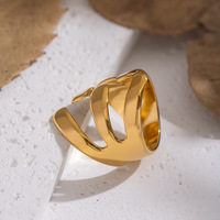 Bague en acier inoxydable avec design d'ouverture de graine de melon asymétrique simple bijoux de conservation des couleurs assortis Style tendance