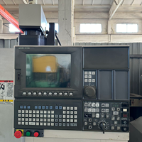 Articles d'occasion de précision ultra-élevée, tour CNC Okuma L390E pour le tournage de pièces d'arbre de moyenne taille et de haute précision.