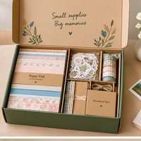 Kit de scrapbooking créatif en papier assorti avec boîte, offrant des fournitures pour album de souvenirs et des outils de décoration de journal pour l'affichage en magasin