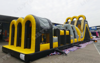 Parcours d'obstacles gonflable géant commercial avec toboggan pour enfants et adultes, idéal pour événements extérieurs, jeu de défi noir et jaune, OEM disponible
