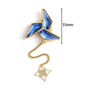 Badge métallique de luxe avec aimant, design moulin à vent et grand diamant bleu - Product Image 2