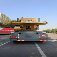 Grue mobile hydraulique STC800 pour camion de 80 tonnes, flèche télescopique de 80 000 kg, hauteur de levage de 68 m, moment de charge élevé, pompe, boîte de vitesses