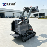 Skid Steer Loader Dengan Bucket dan Garpu untuk Operasi Pemuatan dan Pembongkaran Gudang