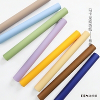Papier d'emballage en rouleau de couleur unie pour macarons, matériau imperméable pour l'emballage de bouquets, vente en gros.