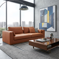 Canapé de bureau moderne en cuir orange, décoration artistique abstraite, sièges professionnels pour espace de travail créatif