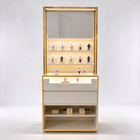 Vitrine d'exposition de montres avec cadre doré, éclairage LED, supports en acrylique, tiroirs et étagère ouverte, certifiée CE ETL, pour les boutiques de montres