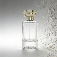 Flacon de parfum cylindrique de luxe en verre 55ML, fond en forme de montagne avec couvercle rond en forme de fleur or et argent