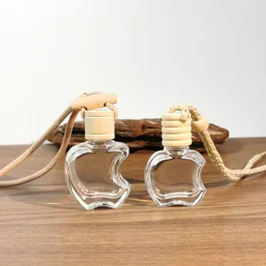 High quality apple shaped empty hanging car air freshener 5ml 10ml perfume glass bottle with wood lid and rope