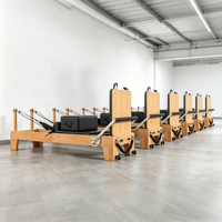 Reformer Pilates en bois de hêtre à rail lisse, lit d'entraînement commercial pour salle de sport avec ressorts réglables