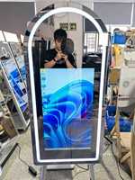 Photomaton miroir de haute qualité avec écran tactile 65 pouces, flash DSLR et impression instantanée pour appareils photo et smartphones, idéal pour les fêtes