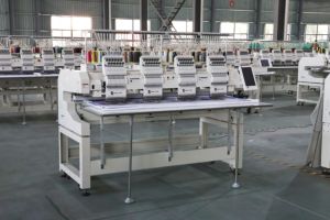 Máquina de Bordar Plana de Cuatro Cabezas de Alta Calidad, Nueva, Máquina Computarizada para Bordar Gorras con Motor - Product Image 2
