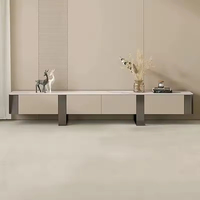 Table basse de luxe moderne haut de gamme au design créatif et minimaliste, plateau en pierre pour salon