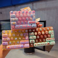 Nouvelle conception YYH – Boîtes mystères créatives et mignonnes – Jouet anti-stress clavier mécanique 26 touches – Porte-clés en silicone dessin animé 1/12