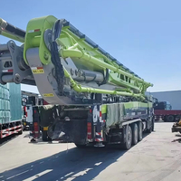Camion pompe à béton Sitrak 70m d'occasion 2024, châssis à moteur diesel haute efficacité, en stock, prêt à être expédié