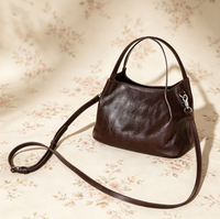 Sac à bandoulière décontracté pour femme, nouvelle collection printemps-été, en cuir véritable, avec fermeture éclair, sangle unique, style urbain et épuré