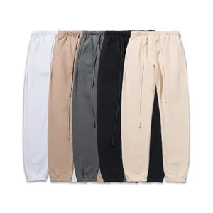 Pantalones de chándal elásticos para hombre y mujer, chándal deportivo de algodón, con logotipo personalizado, Color sólido, informal, para correr y Fitness