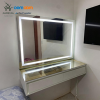 JIAMEIJIA Coiffeuse murale flottante moderne avec miroir LED réglable, plateau en verre doré et panneau de rangement extensible