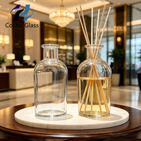 Bouteilles de diffuseur d'arômes en verre rond de luxe 50 ml 100 ml pour rafraîchisseurs d'air