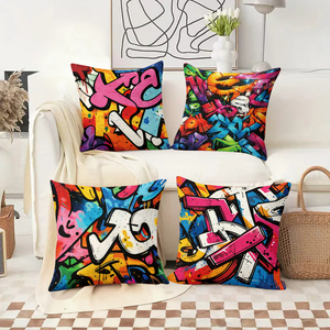 Canlı grafiti tarzı yastıklar, rahat oturma odası dekoruna cesur bir kentsel sanat katıyor. - Product Image 2