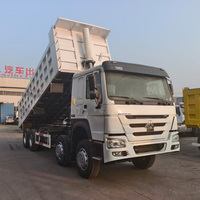Prix d'usine SINOTRUK HOWO NX 8x4 Camion benne d'occasion 12 roues pour l'Afrique pour le transport de sable et de gravier