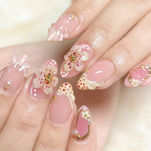 <span class=keywords><strong>Uñas</strong></span> Postizas Cortas Almendradas Color Rosa Nude con Diseño 3D <span class=keywords><strong>de</strong></span> <span class=keywords><strong>Flor</strong></span> <span class=keywords><strong>de</strong></span> <span class=keywords><strong>Cerezo</strong></span> y Perla Francesa para Uso Diario - Product Image 1