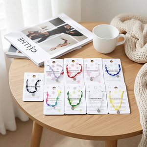 Braccialetto Angelina in Acciaio Inox con Nodo a Sette Stelle, Set di 12 Bracciali alla Moda Unisex, Gioielli Regalo Prodotti in Cina - Product Image 5