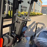 Chariot élévateur électrique 3T avec batterie au plomb-acide, pneus pleins et positionneur de fourches pour le chargement et le déchargement en extérieur