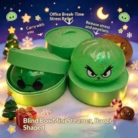 Boîte surprise interactive de Noël : Boules vertes Grinch lumineuses en TPR à texture moelleuse et à récupération lente