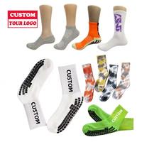 Chaussettes de sport de compression professionnelles en gros, antidérapantes, respirantes en maille et personnalisables pour le football (collection Printemps)