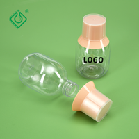 Nouveau design Bouteille de sirop contre la toux Bouteille de liquide oral avec tasse à mesurer propre
