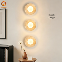 Lampe murale simple en travertin jaune, intensité réglable sur mesure, vente en gros pour couloirs, escaliers, foyer unique texturé, décoration maison et restaurant