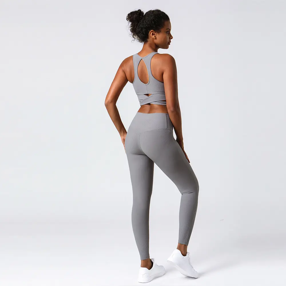 Vendita calda di alta qualità da donna elasticizzati attillati da Yoga Set di abbigliamento Yoga Top con pantaloni