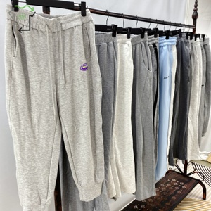 Vente en gros d'usine, pantalons de sport en coton épais d'occasion, cordon de serrage, hiver, course à pied, chaud, décontracté, pantalon de survêtement doux, vêtements d'occasion en balles - Product Image 1