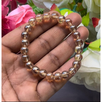 Bracelet en quartz à l'aura dorée : perles rondes en pierres précieuses, bracelet extensible, style classique unisexe, cadeau d'anniversaire certifié