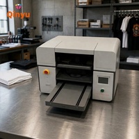 Imprimante textile DTG Qinyu A3 à double station, haute vitesse, pour l'impression de t-shirts, polos, sweats à capuche et vêtements personnalisés, la plus populaire