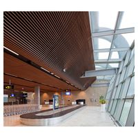 Plafond suspendu en alliage d'aluminium à lattes, style grain de bois, pour décoration de bureau moderne