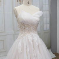 Robe de mariée élégante au design unique Robe de mariée de haute qualité Robe de mariée sans bretelles