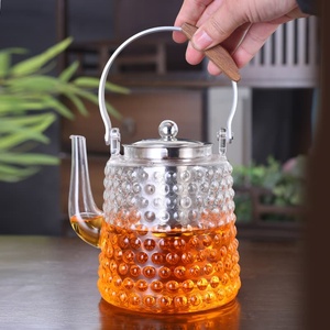 Théière en verre borosilicate haute résistance au chaleur, design classique, origine Anhui, avec infuseur, poignée et couvercles, surface à texture particulaire, pour services à café et thé - Product Image 2