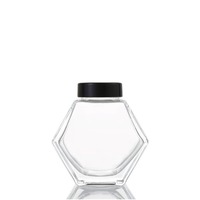 Venta al por mayor tarro de vidrio hexagonal para miel 100 mL 360 ml mejor tarro de botella de jarabe de miel con cucharón de madera y grano de madera/tapa de aluminio