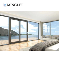 Portes anti-ouragan modernes Minglei, grandes fenêtres coulissantes et portes patio en alliage d'aluminium pour villa avec surface finie