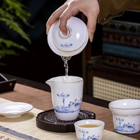 Service à thé en porcelaine de Jingdezhen motif lotus pour usage domestique, vente en gros, ensemble 8 pièces bleu et blanc, tasses Kung Fu et Gaiwan, cadeau d'entreprise