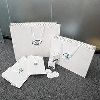 OEM Coated Paper Bag Custom Art Pattern Printed White Ribbon Handle for Gift Apparel Packing