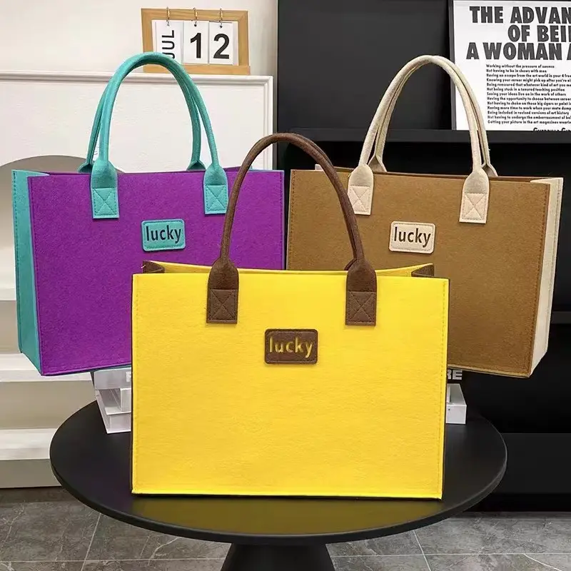 2024 yaratıcı keçe Tote çanta kadın şık alışveriş parti seyahat çantası, sıcak satış yeni tasarım keçe çanta