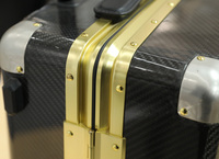 Valise rigide en fibre de carbone avec cadre en aluminium, serrure TSA, 4 roues pivotantes, bagage de voyage, vente en gros d'usine dorée