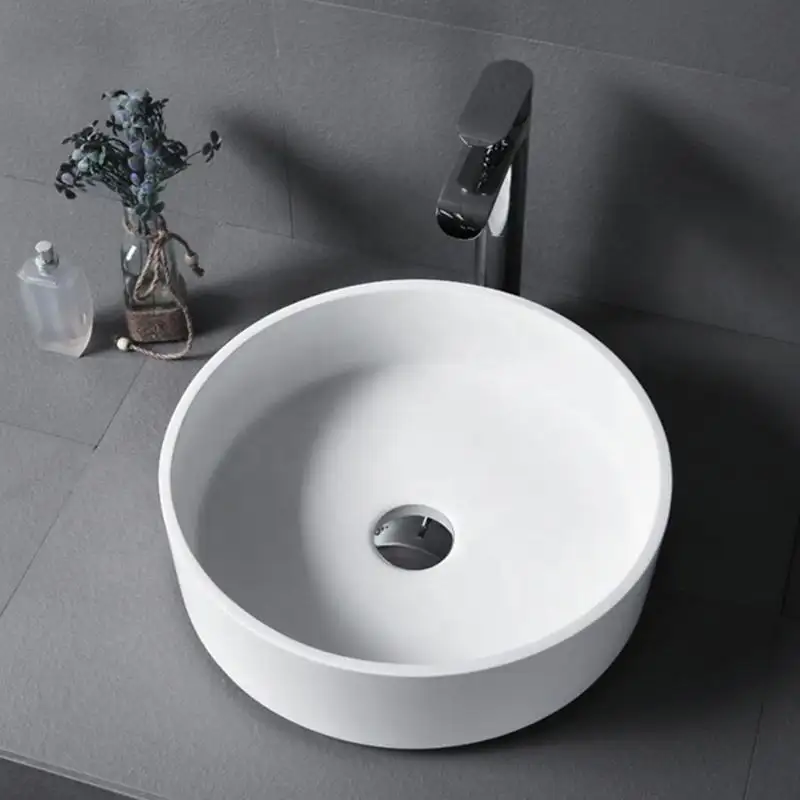 Wholesale Modern Design Sanitary Ware Round Countertop Bathroom Cabinet Resin Counter Top Wash Basin For Small Lavatory