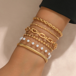 Bracelet croisé multicouche au design simple et luxueux, élégant et personnalisé pour femme, en alliage, bijoux de mode en gros - Product Image 1