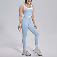 Ensemble de yoga pour femme : Débardeur côtelé brossé à contraste de couleurs avec découpe au dos et pantalon long taille haute sculptant les hanches et le ventre