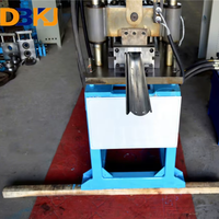 Machine de formage de portes à volets roulants d'occasion à prix réduit avec perforation hydraulique et découpe hydraulique