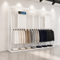 Présentoir de vêtements autoportant blanc à deux poteaux avec base de mannequin pour aménagement de boutique